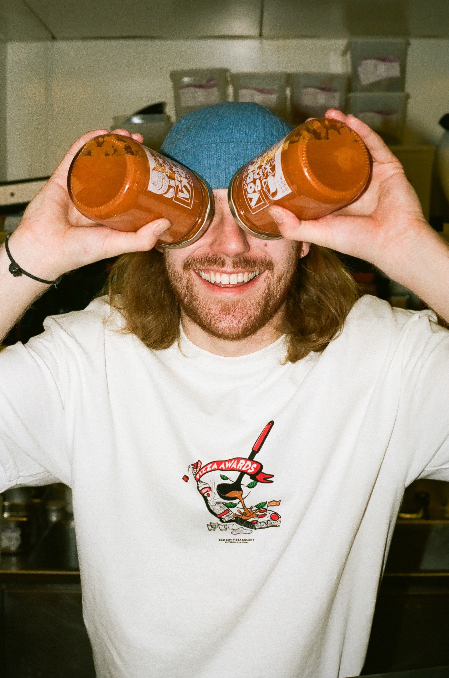 A maker holding their jars